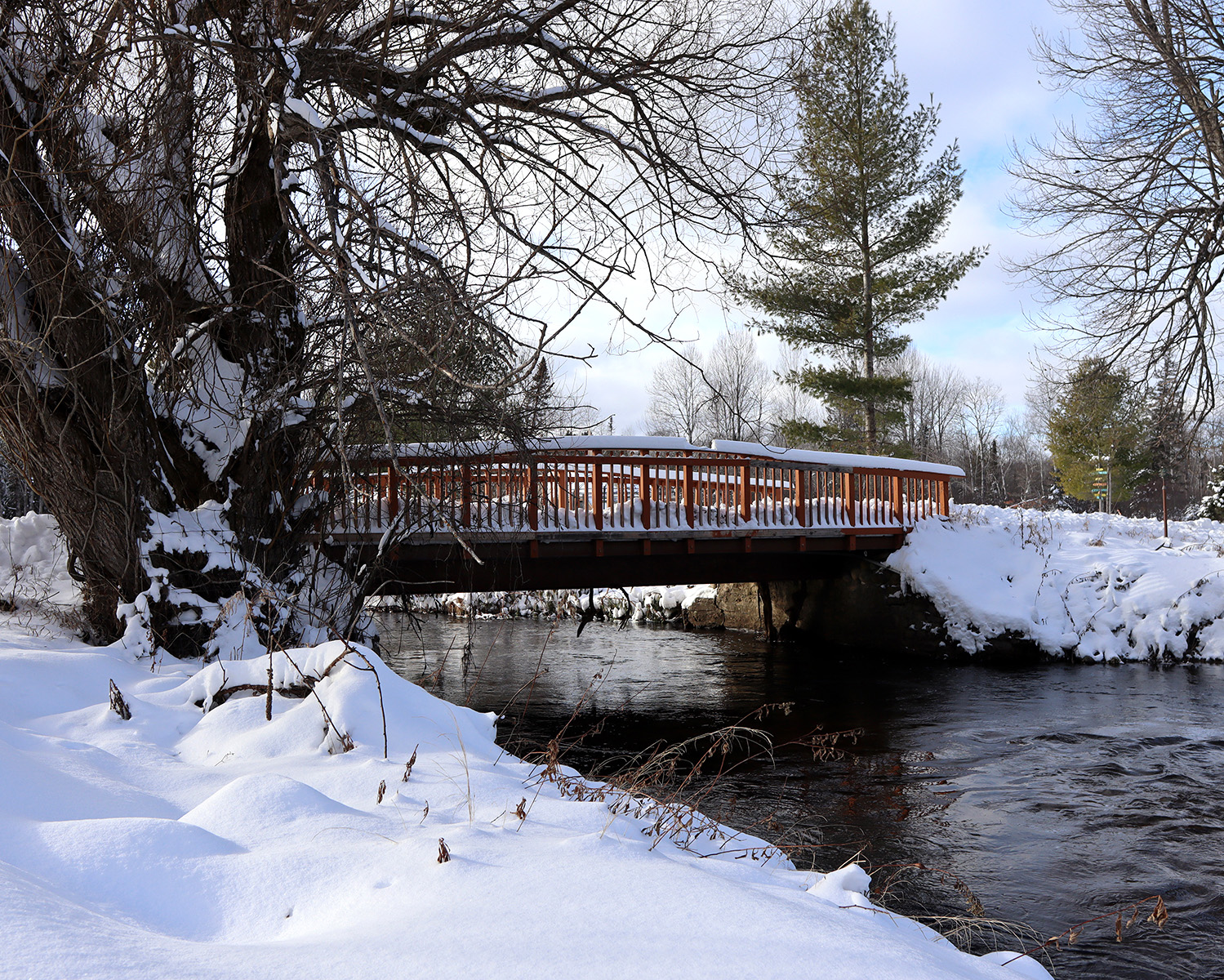 Photo of small bridge at yoga retreat in winter - location reference for design